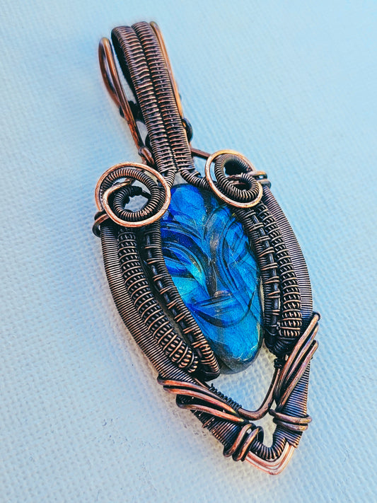 Labradorite gemstone with alien face wire wrapped in copper in heady style